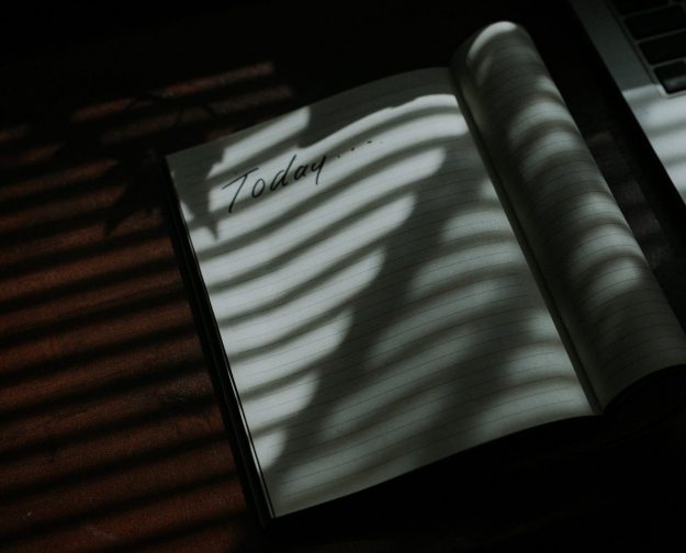 white and black striped textile